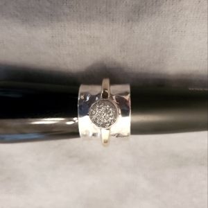 Elegant wide sterling silver ring with rough black quartz accent